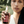 Load image into Gallery viewer, Model holding Revitalize hair oil - Moroccan Elixir
