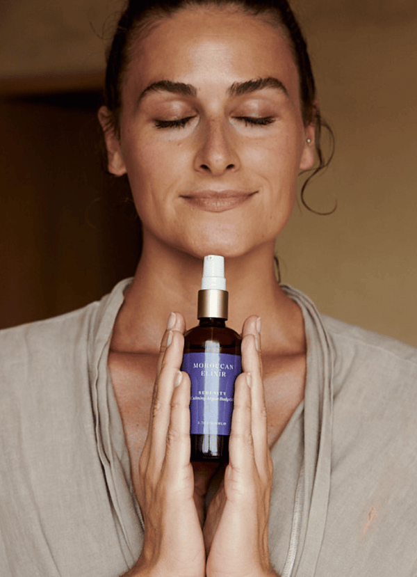 Women holding Serenity Argan oil